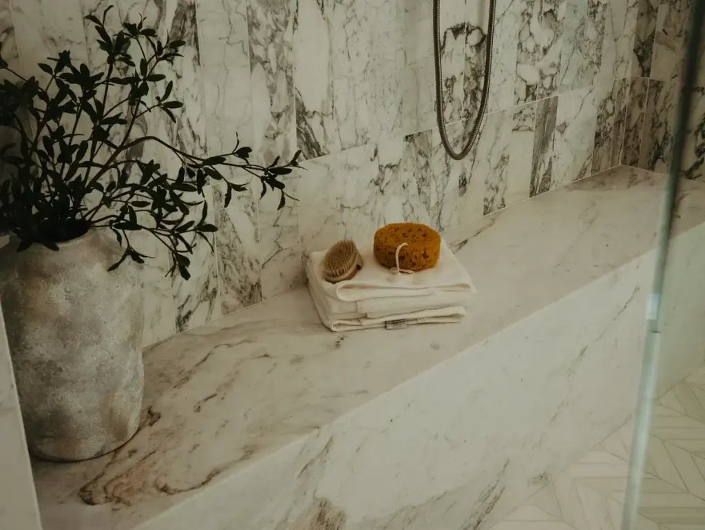 Close-up of veined marble on a shower wall